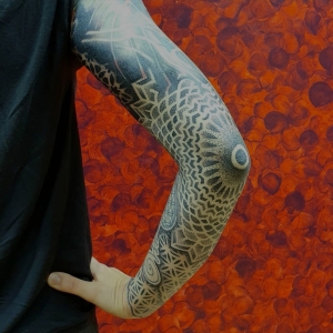mandala elbow tattoo