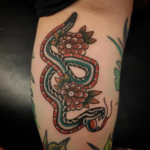 traditional snake flowers tattoo