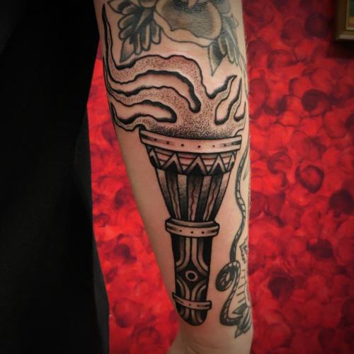 traditional torch flame tattoo