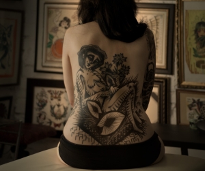 backpiece lady tattoo